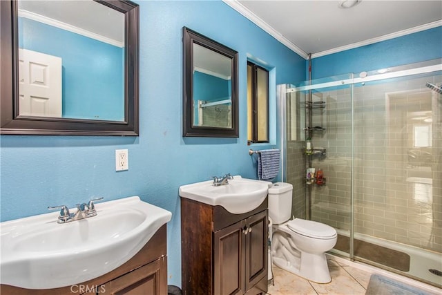 bathroom featuring crown molding, vanity, tile patterned floors, toilet, and walk in shower