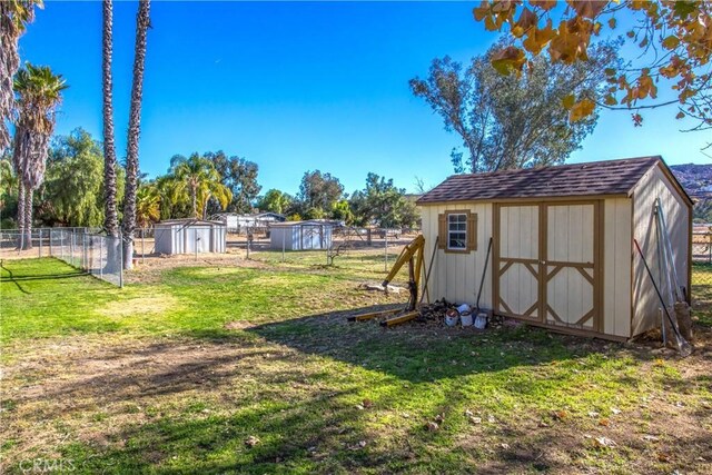 view of yard with a storage shed