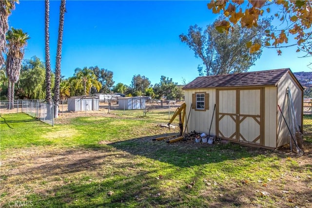 view of yard with a storage unit