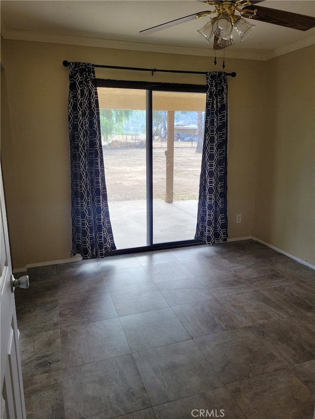 unfurnished room with ceiling fan and ornamental molding