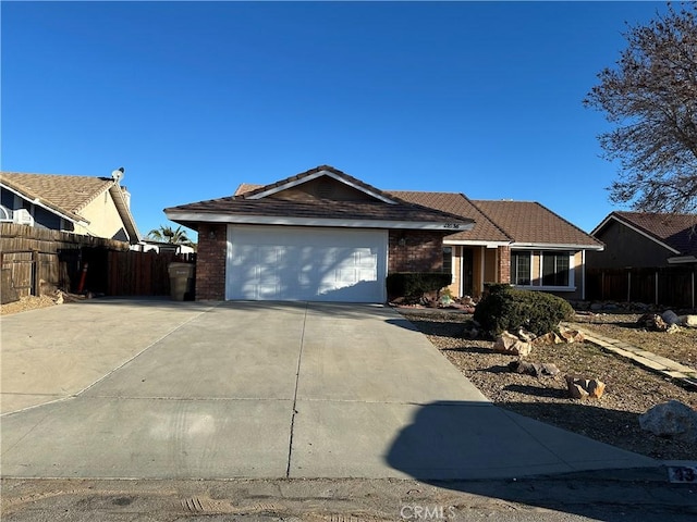 single story home with a garage