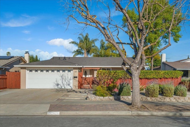 ranch-style home with a garage