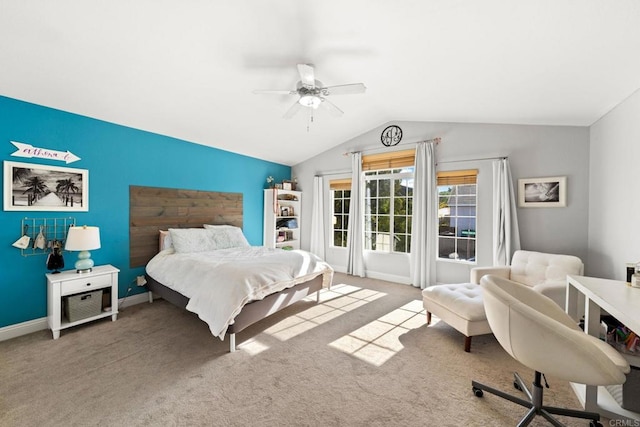 bedroom with lofted ceiling, light colored carpet, and ceiling fan