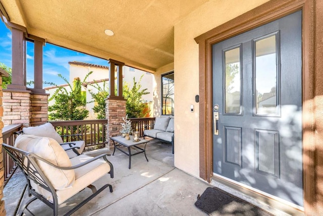 entrance to property with covered porch