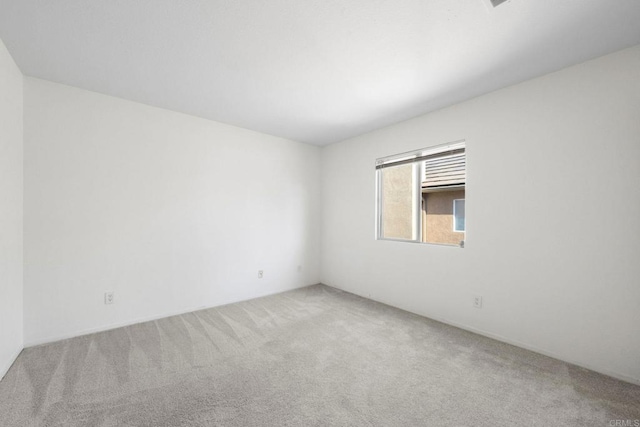 unfurnished room with carpet floors