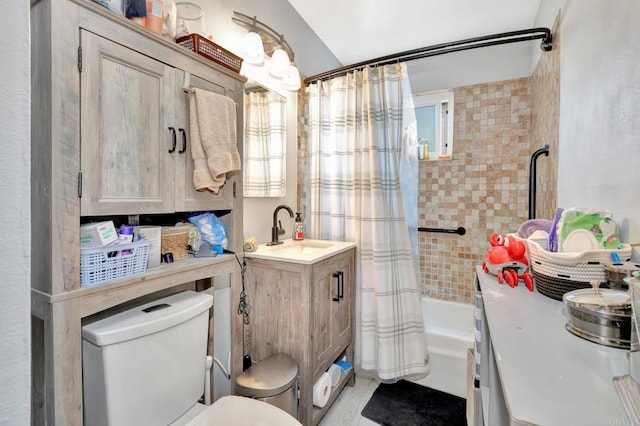 full bathroom featuring toilet, vanity, and shower / bathtub combination with curtain