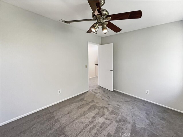 carpeted empty room with ceiling fan