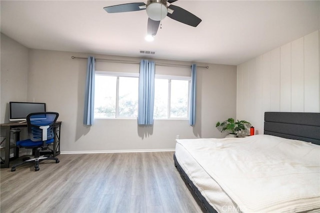 bedroom featuring ceiling fan and light hardwood / wood-style floors