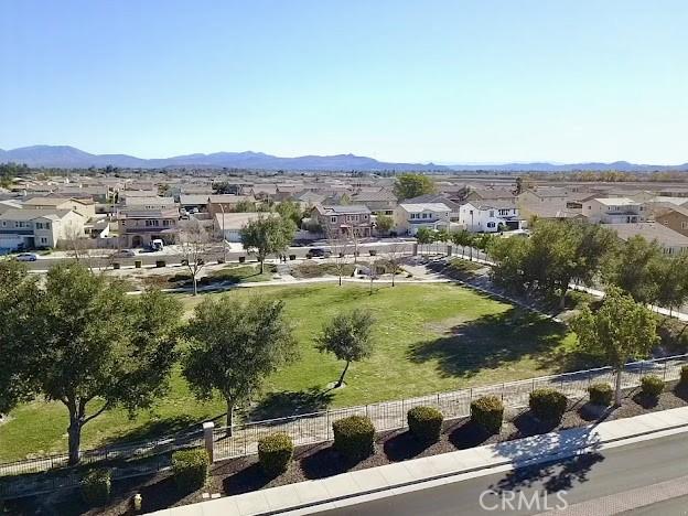 aerial view featuring a mountain view and a residential view