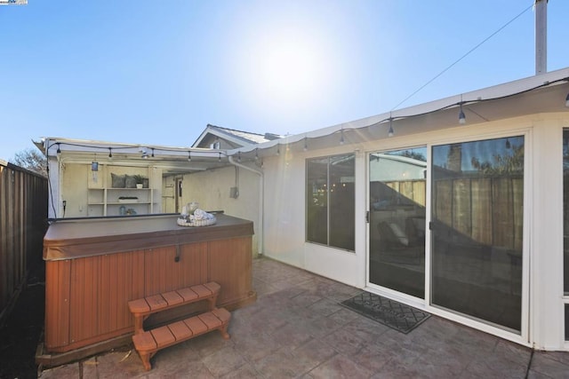 view of patio featuring a hot tub