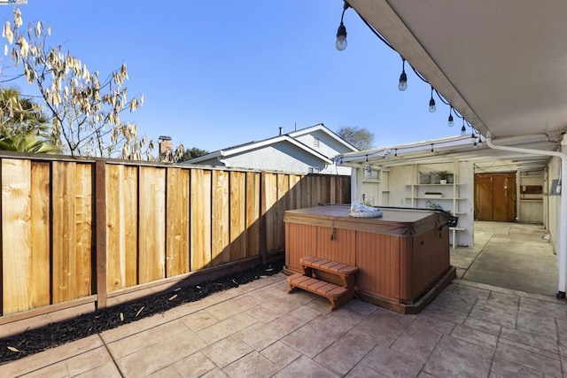 view of patio featuring a hot tub