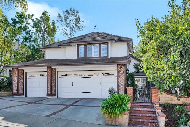 front of property featuring a garage