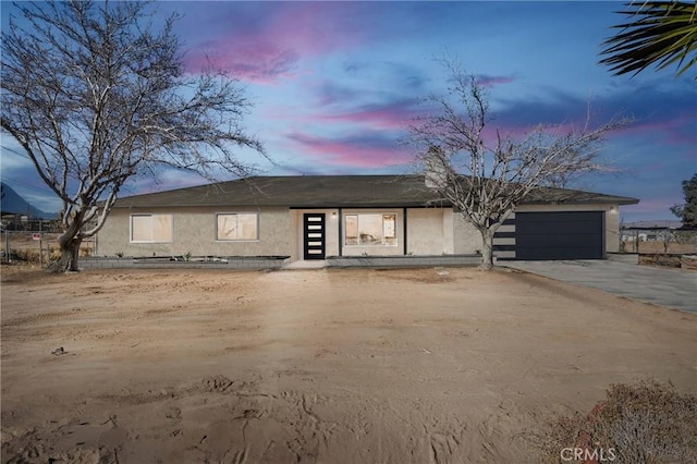 view of front of property featuring a garage