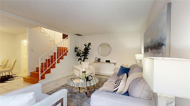 living room with light tile patterned floors