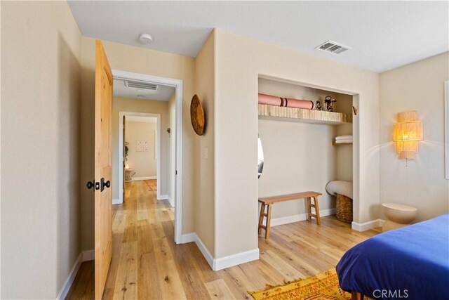 bedroom featuring light hardwood / wood-style floors