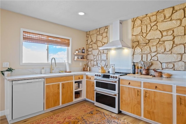 1388 Fortuna Ave, Landers, CA 92285 - kitchen with wall chimney range hood, white appliances, open shelves, light countertops, and light wood-style flooring