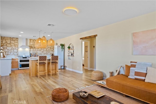 1388 Fortuna Ave, Landers, CA 92285 - living room featuring light wood finished floors