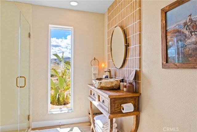 1388 Fortuna Ave, Landers, CA 92285 - doorway to outside with a sink and baseboards