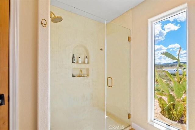 bathroom with walk in shower