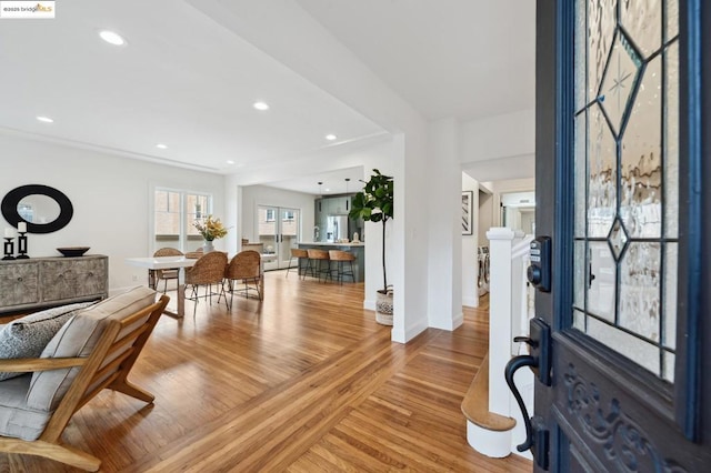 foyer with light hardwood / wood-style floors