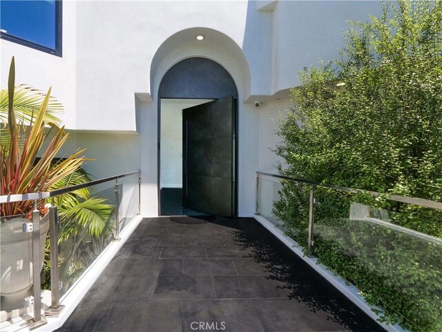 property entrance with a balcony