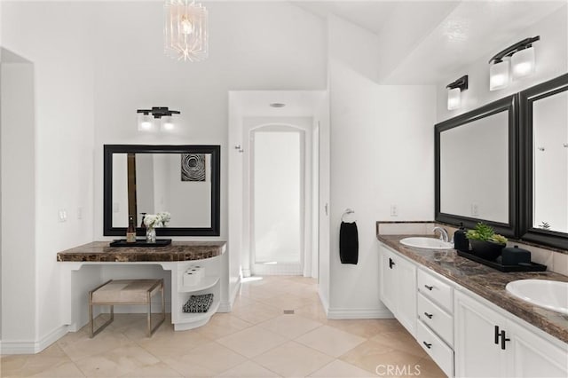 bathroom featuring tile patterned floors and vanity