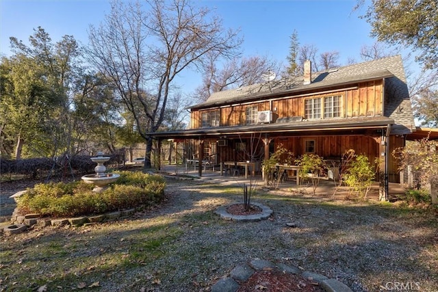 rear view of house with a patio area