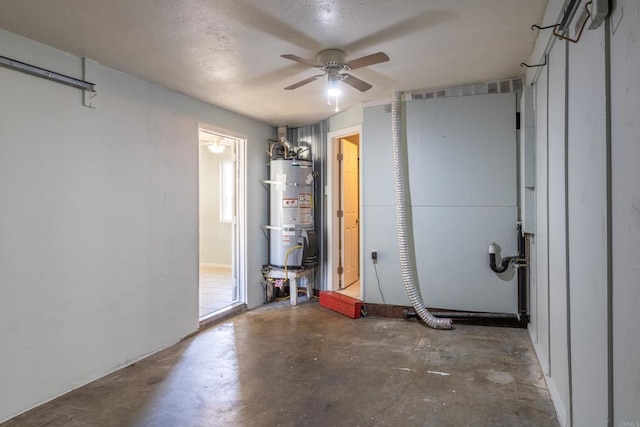 interior space featuring ceiling fan and strapped water heater