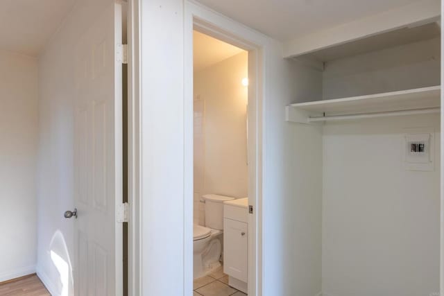 laundry room with light tile patterned floors