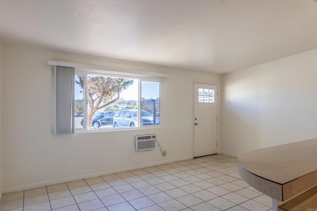 tiled entrance foyer featuring a wall mounted air conditioner