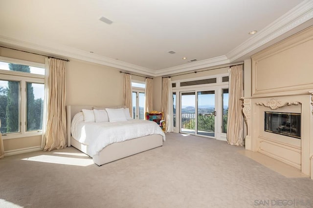 unfurnished bedroom featuring access to outside, light colored carpet, and ornamental molding