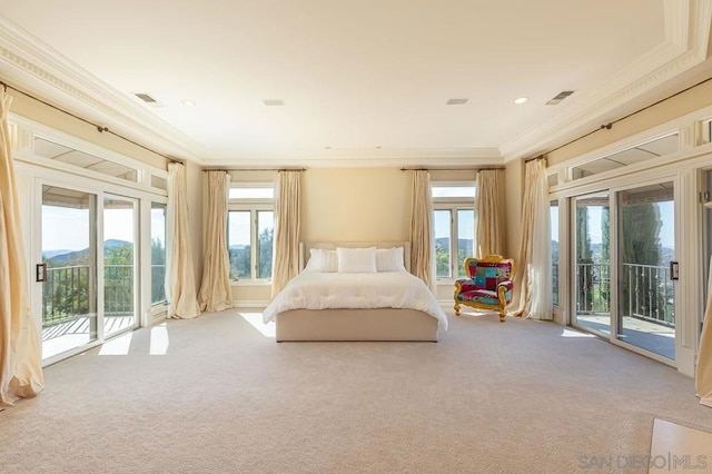 unfurnished bedroom featuring ornamental molding, access to outside, carpet, and a mountain view