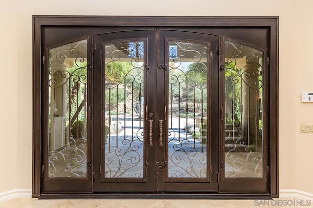 doorway featuring french doors