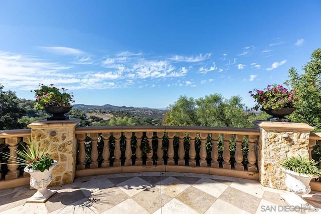 view of gate featuring a mountain view