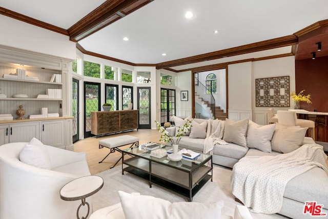 living room with ornamental molding