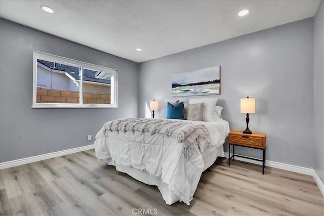 bedroom featuring light hardwood / wood-style floors