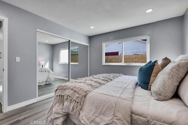 bedroom featuring hardwood / wood-style flooring