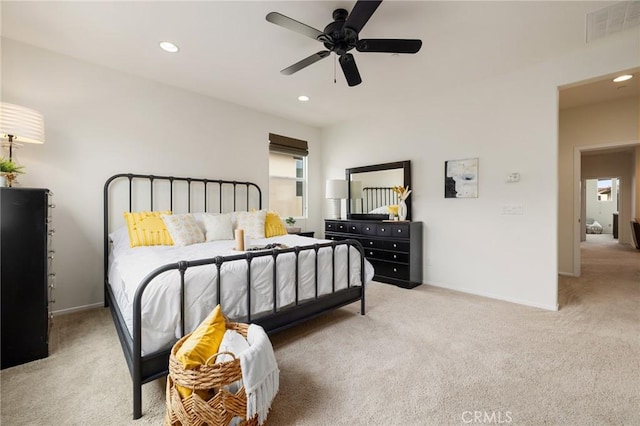 carpeted bedroom featuring ceiling fan