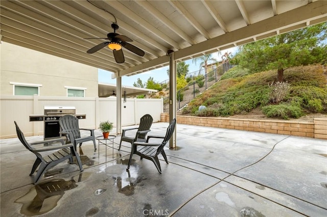 view of patio / terrace featuring ceiling fan and a grill