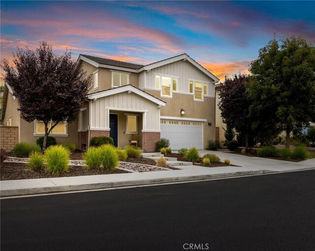 view of front of property with a garage