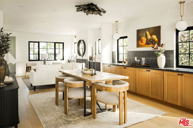 dining room featuring light wood-type flooring