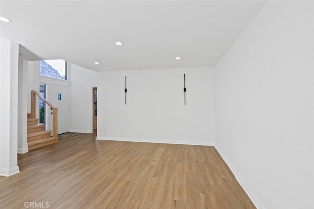 unfurnished room featuring light hardwood / wood-style flooring