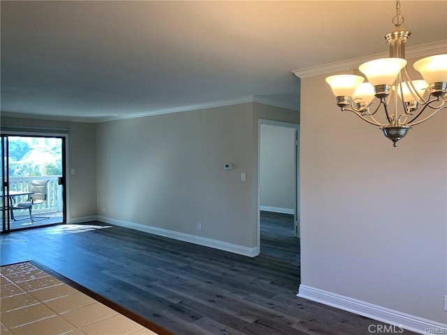 unfurnished room with a notable chandelier, crown molding, and dark hardwood / wood-style floors