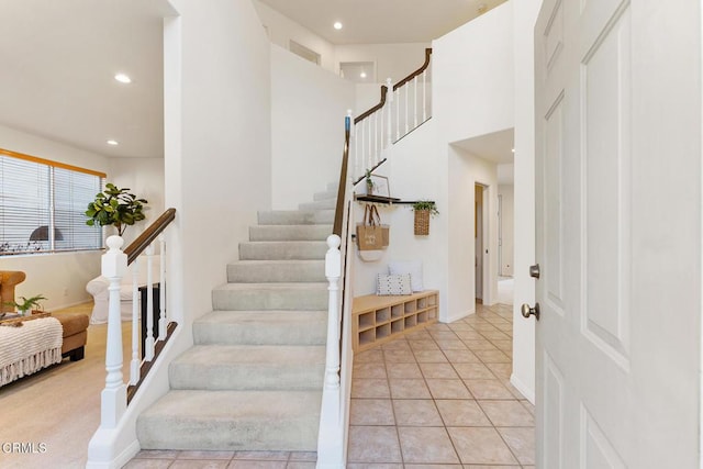 staircase with tile patterned flooring