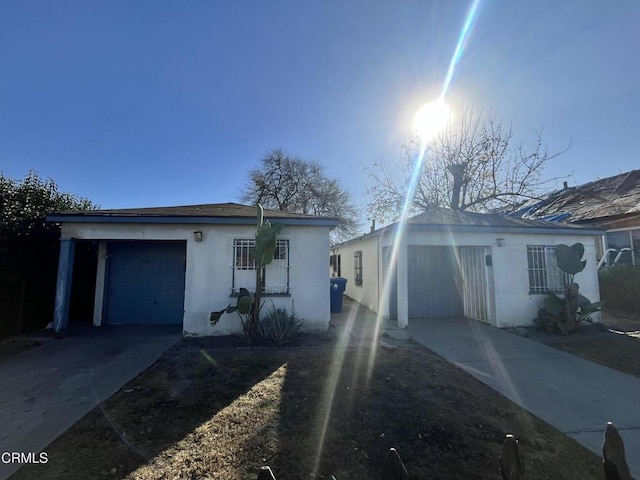 single story home with a garage