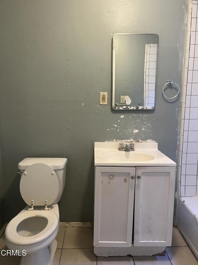 full bathroom featuring tile patterned flooring,  shower combination, vanity, and toilet