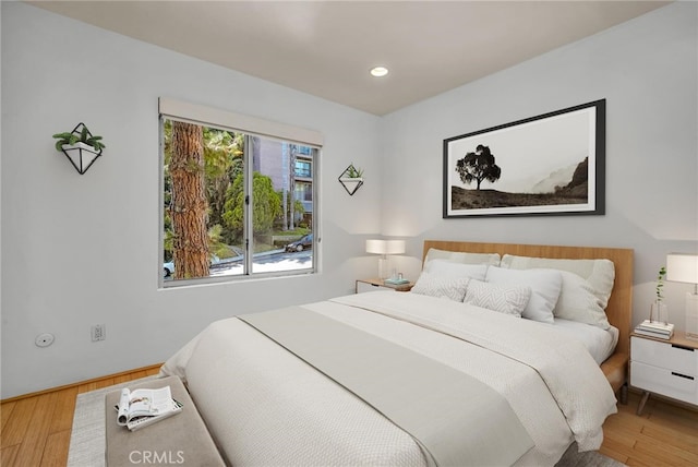 bedroom featuring hardwood / wood-style flooring