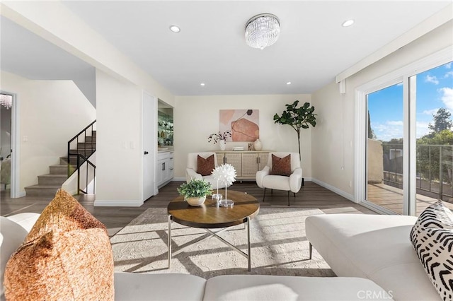 living room with dark hardwood / wood-style flooring