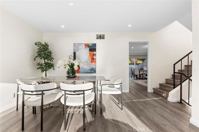 dining room featuring wood-type flooring