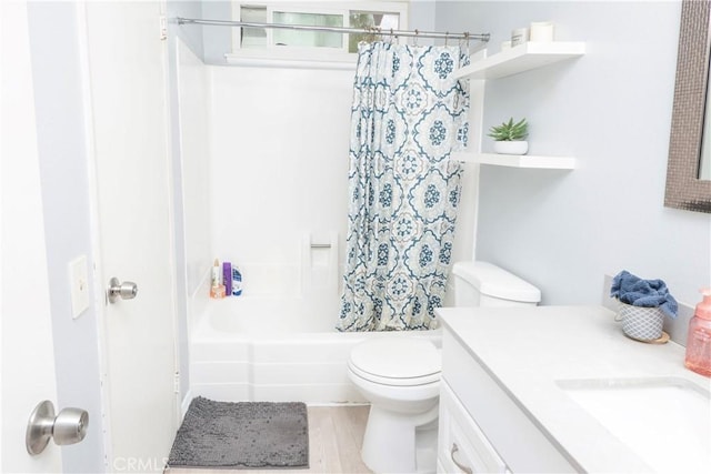 full bathroom with toilet, wood-type flooring, vanity, and shower / tub combo with curtain